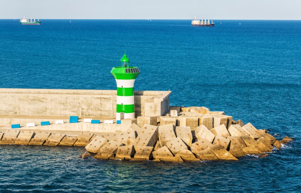 Barcelona Lighthouse: A Beacon of Catalan History - Spain, Lighthouse, Barcelona | SeektoExplore.com